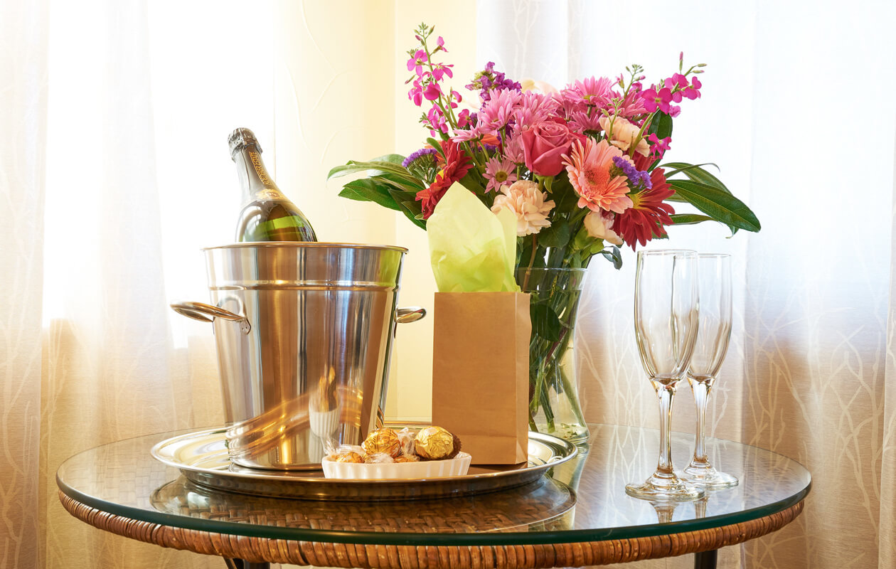 Champagne and flowers on a table
